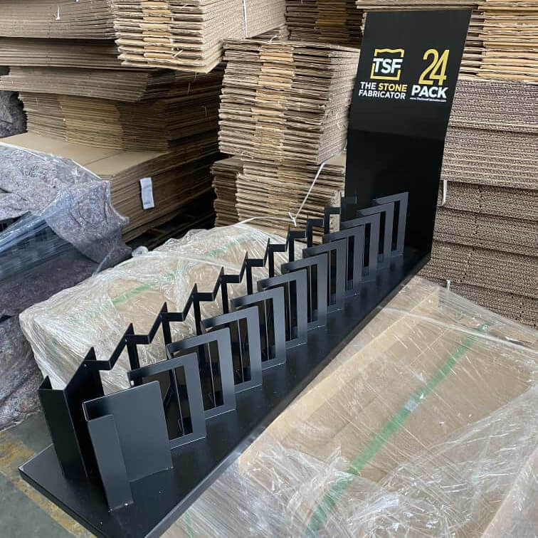 Branded TSF 24-Pack countertop sample display with individual sample slots