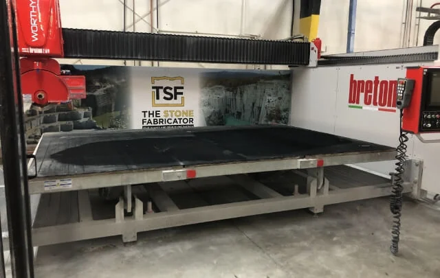 Breton Worthy CNC saw with a TSF sign in the fabrication centre.